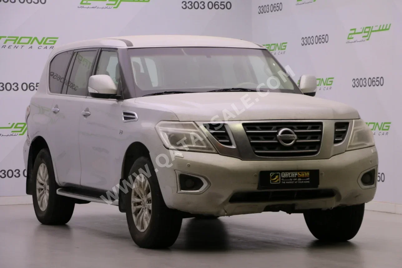 نيسان  باترول  ال اي  2016  اوتوماتيك  330,000 كم  8 سلندر  دفع رباعي  اس يو في  فضي