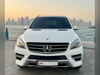 مرسيدس - بنز  ام ال  500 AMG  2013  اوتوماتيك  172,000 كم  8 سلندر  دفع كلي مستمر  اس يو في  أبيض  تحت الضمان