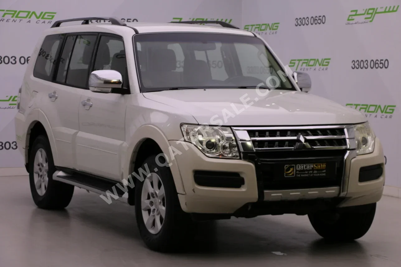 ميتسوبيشي  باجيرو  2016  اوتوماتيك  179,000 كم  6 سلندر  دفع رباعي  اس يو في  أبيض لؤلؤي