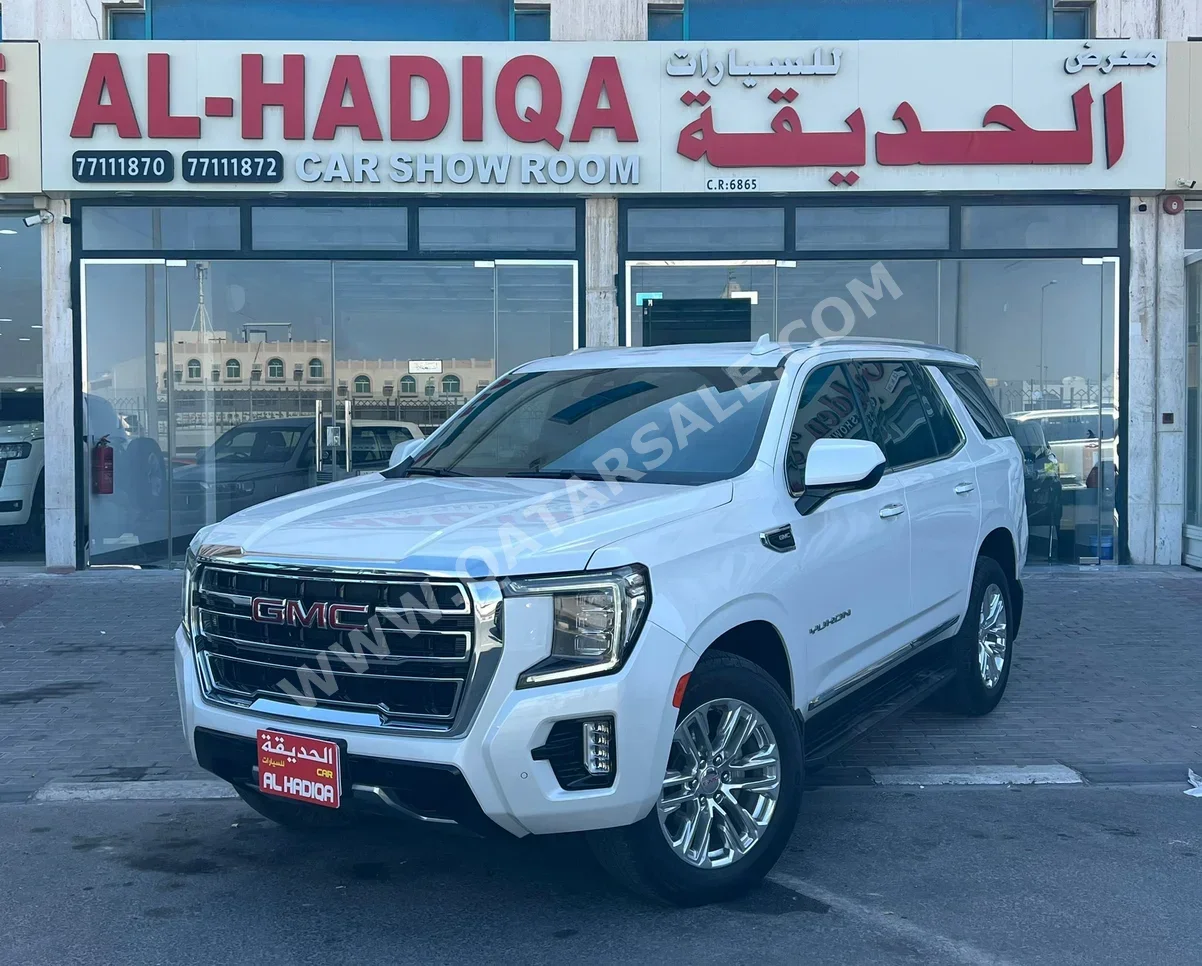 GMC  Yukon  2023  Automatic  56,000 Km  8 Cylinder  Four Wheel Drive (4WD)  SUV  White  With Warranty