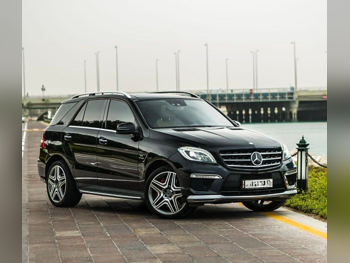 Mercedes-Benz  ML  63 AMG  2013  Automatic  126,000 Km  8 Cylinder  Four Wheel Drive (4WD)  SUV  Black
