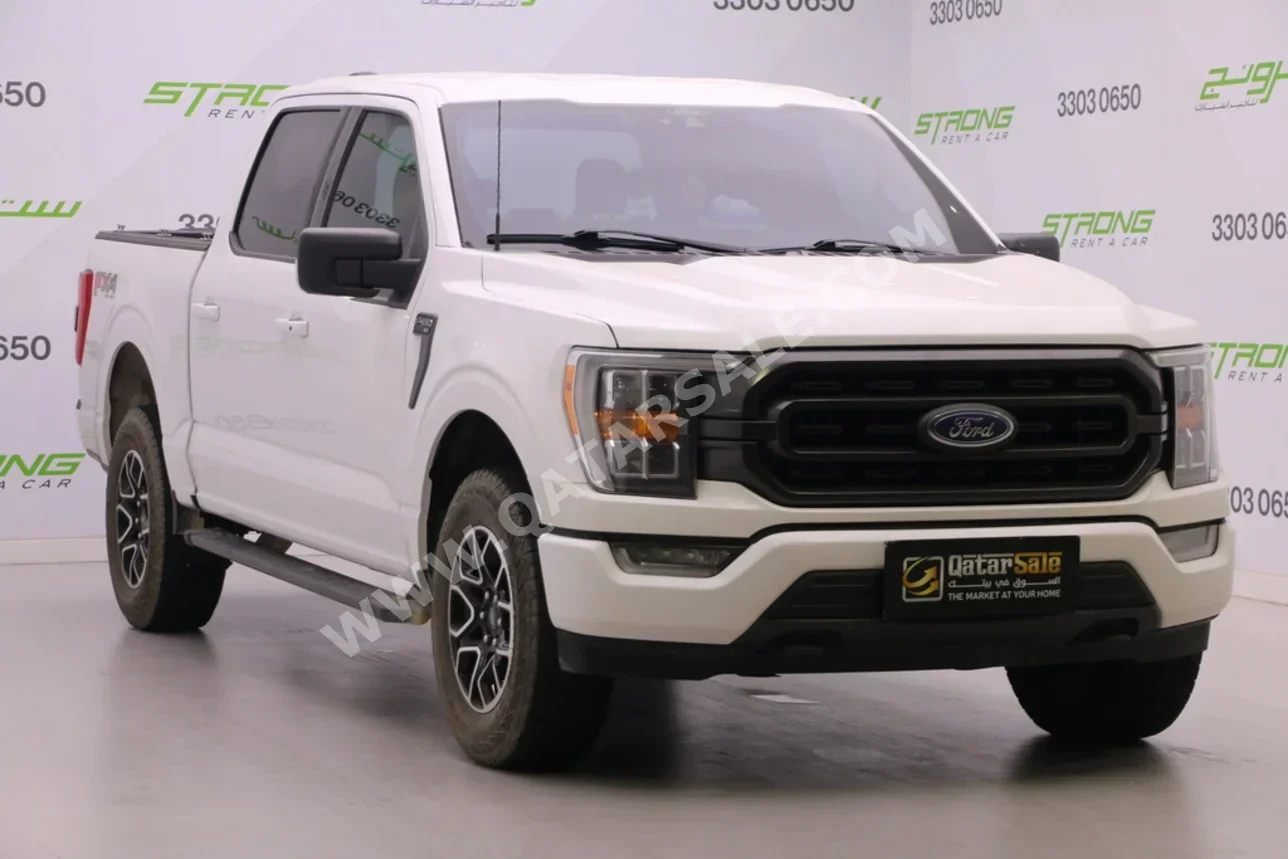 Ford  F  150  2021  Automatic  82,000 Km  8 Cylinder  Four Wheel Drive (4WD)  Pick Up  White  With Warranty