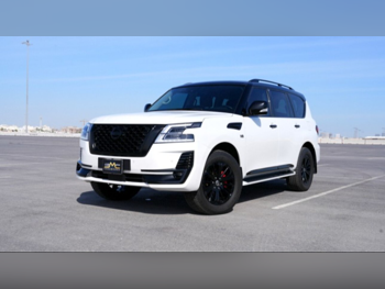 نيسان  باترول  ال اي  2024  اوتوماتيك  15,000 كم  8 سلندر  دفع رباعي  اس يو في  أبيض  تحت الضمان