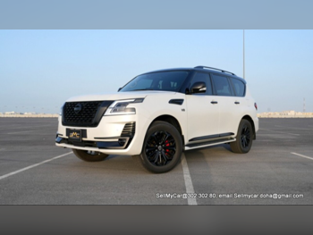 Nissan  Patrol  LE  2024  Automatic  15,000 Km  8 Cylinder  Four Wheel Drive (4WD)  SUV  White  With Warranty