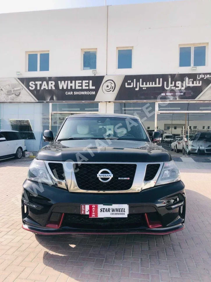 نيسان باترول نسمو 2016 اوتوماتيك 209,000 كم 8 سلندر دفع رباعي اس يو في أسود