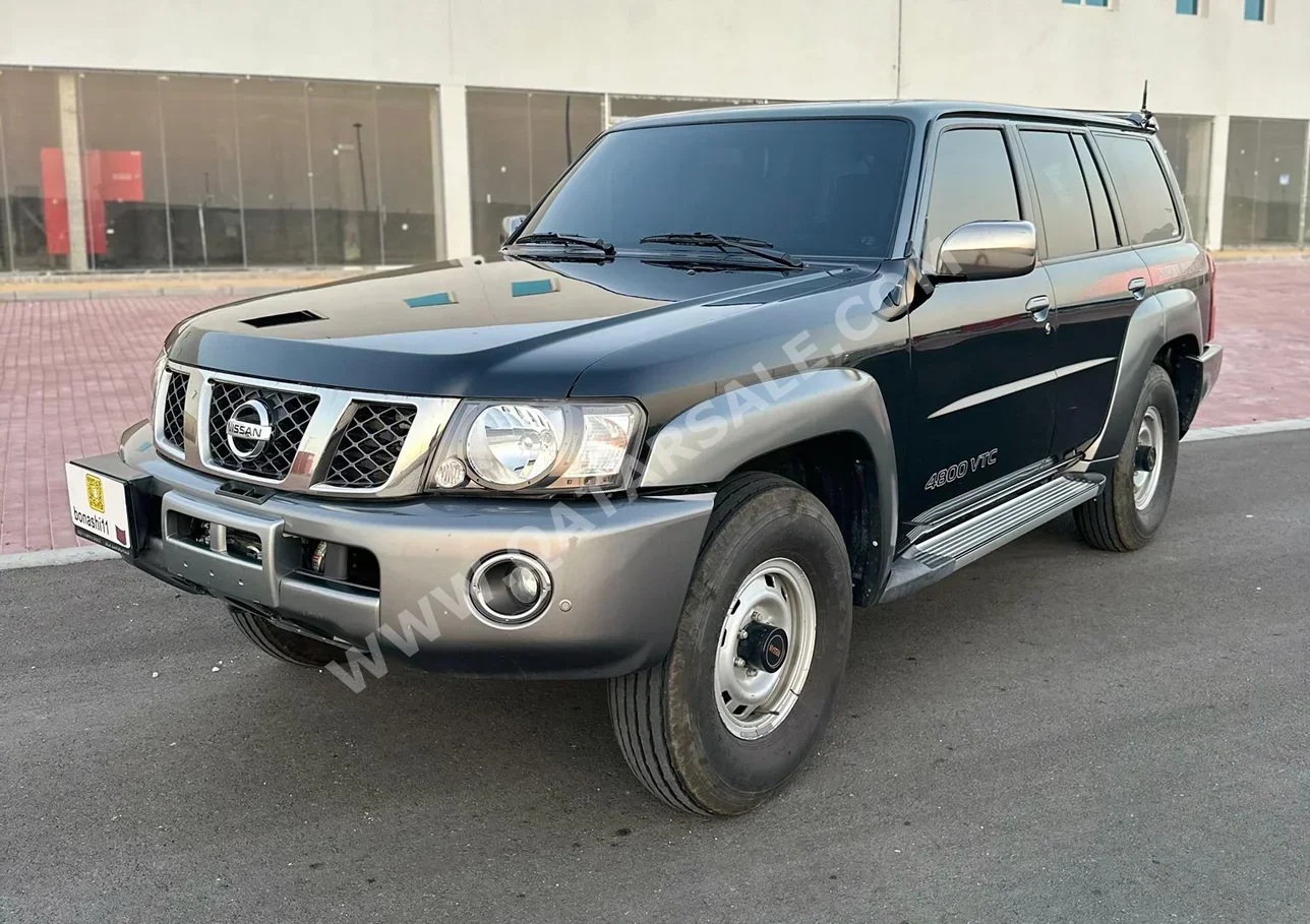 Nissan  Patrol  Safari  2021  Manual  77,000 Km  6 Cylinder  Four Wheel Drive (4WD)  SUV  Black