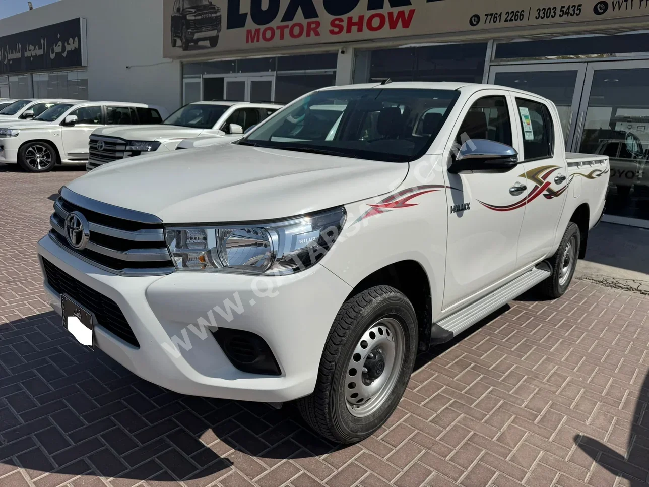Toyota  Hilux  2025  Automatic  32,000 Km  4 Cylinder  Four Wheel Drive (4WD)  Pick Up  White  With Warranty