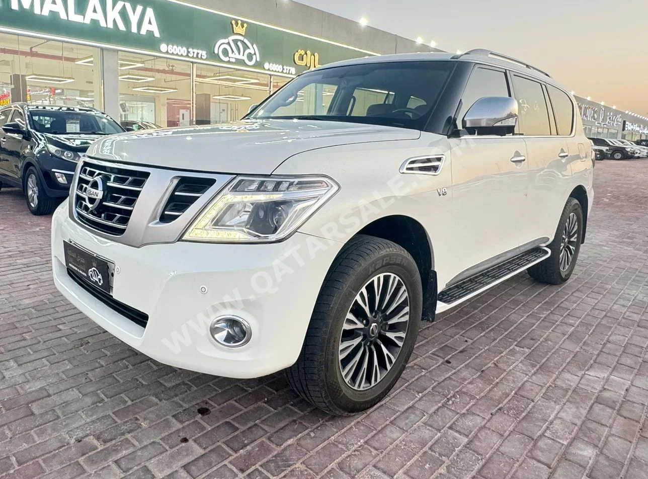 Nissan Patrol Platinum 2015 Automatic 194,000 Km 8 Cylinder Four Wheel Drive (4WD) SUV White
