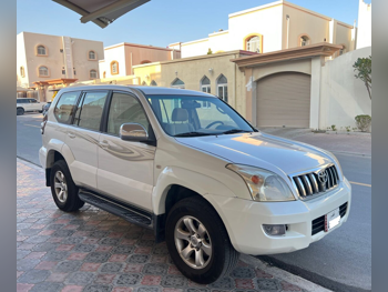 Toyota  Prado  VX  2009  Automatic  270,000 Km  6 Cylinder  Four Wheel Drive (4WD)  SUV  Pearl