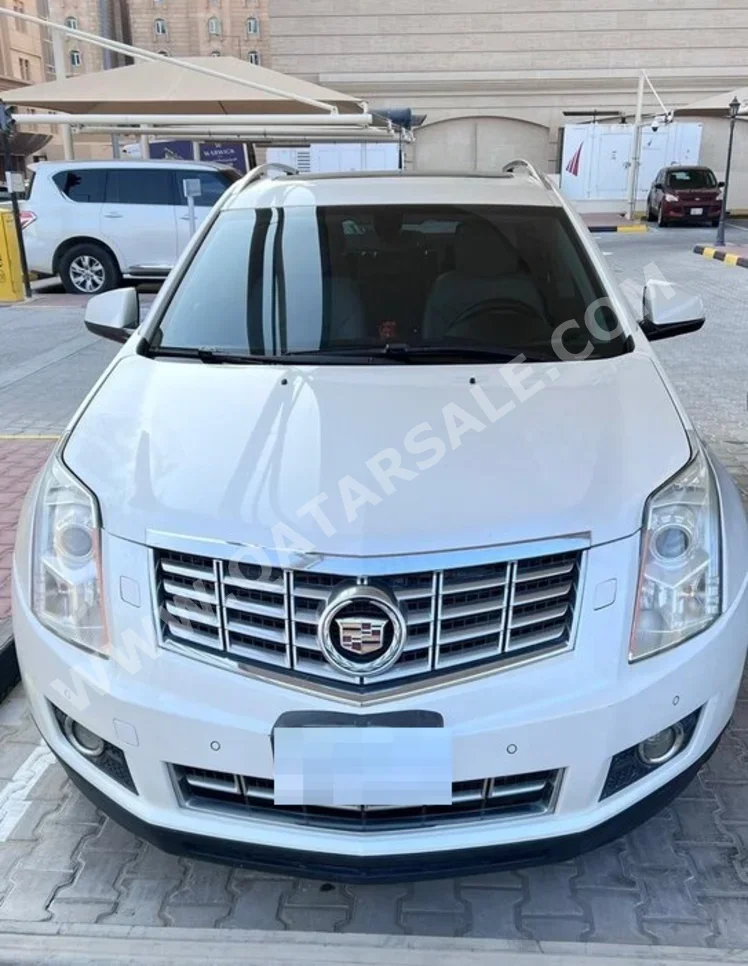 كاديلاك  اس ار اكس  2014  اوتوماتيك  215,000 كم  6 سلندر  دفع رباعي  اس يو في  أبيض