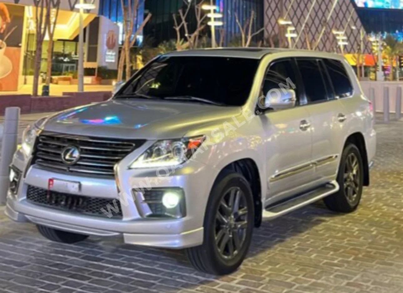 لكزس ال اكس 570 2015 اوتوماتيك 191,800 كم 8 سلندر دفع رباعي اس يو في فضي