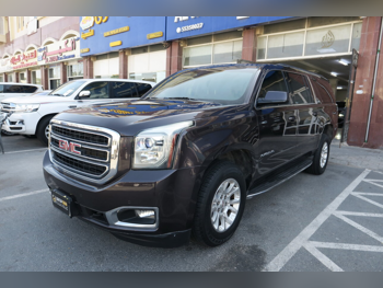 GMC  Yukon  XL  2015  Automatic  230,000 Km  8 Cylinder  Four Wheel Drive (4WD)  SUV  Gray
