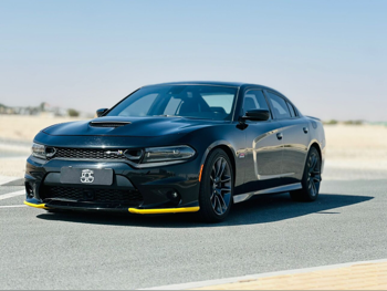 دودج  تشارجر  هيمي  2023  اوتوماتيك  7,000 كم  8 سلندر  دفع خلفي  سيدان  رمادي