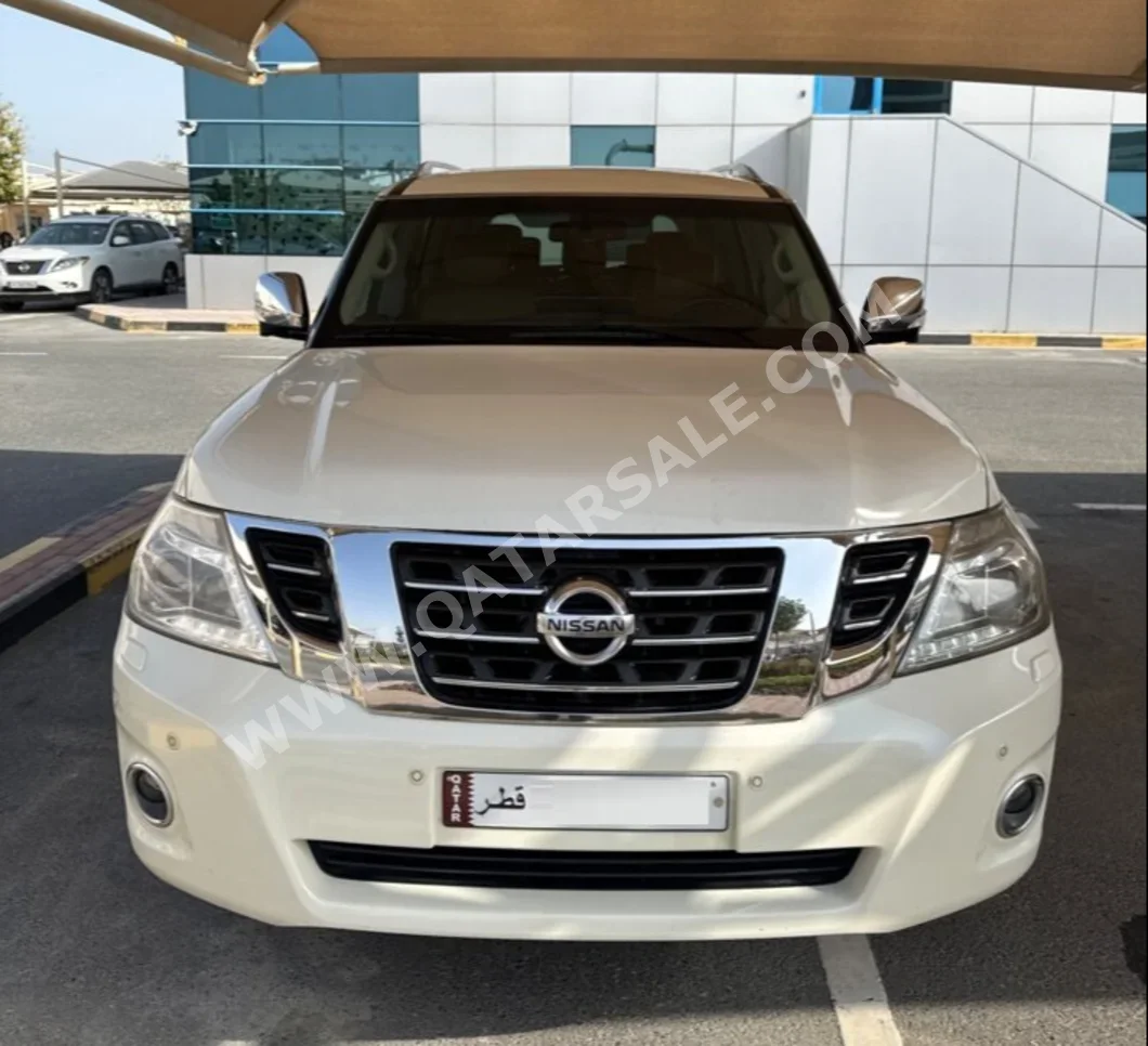 Nissan Patrol LE 2014 Automatic 165,500 Km 8 Cylinder Four Wheel Drive (4WD) SUV White