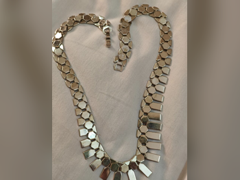 الفضة حسب القطعة ( ديزاينرز) \  قلادة