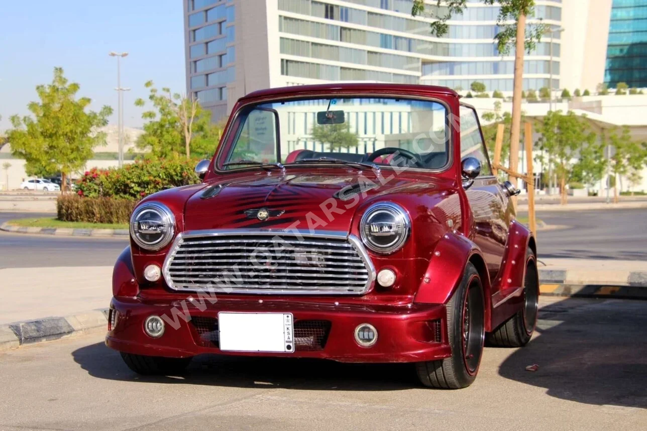 Mini  Cooper  1978  Automatic  90,000 Km  4 Cylinder  Front Wheel Drive (FWD)  Classic  Dark Red