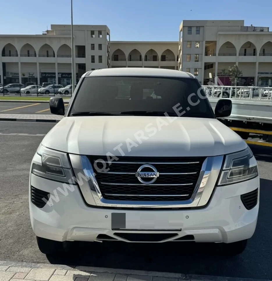 Nissan Patrol XE 2020 Automatic 70,000 Km 6 Cylinder Four Wheel Drive (4WD) SUV White
