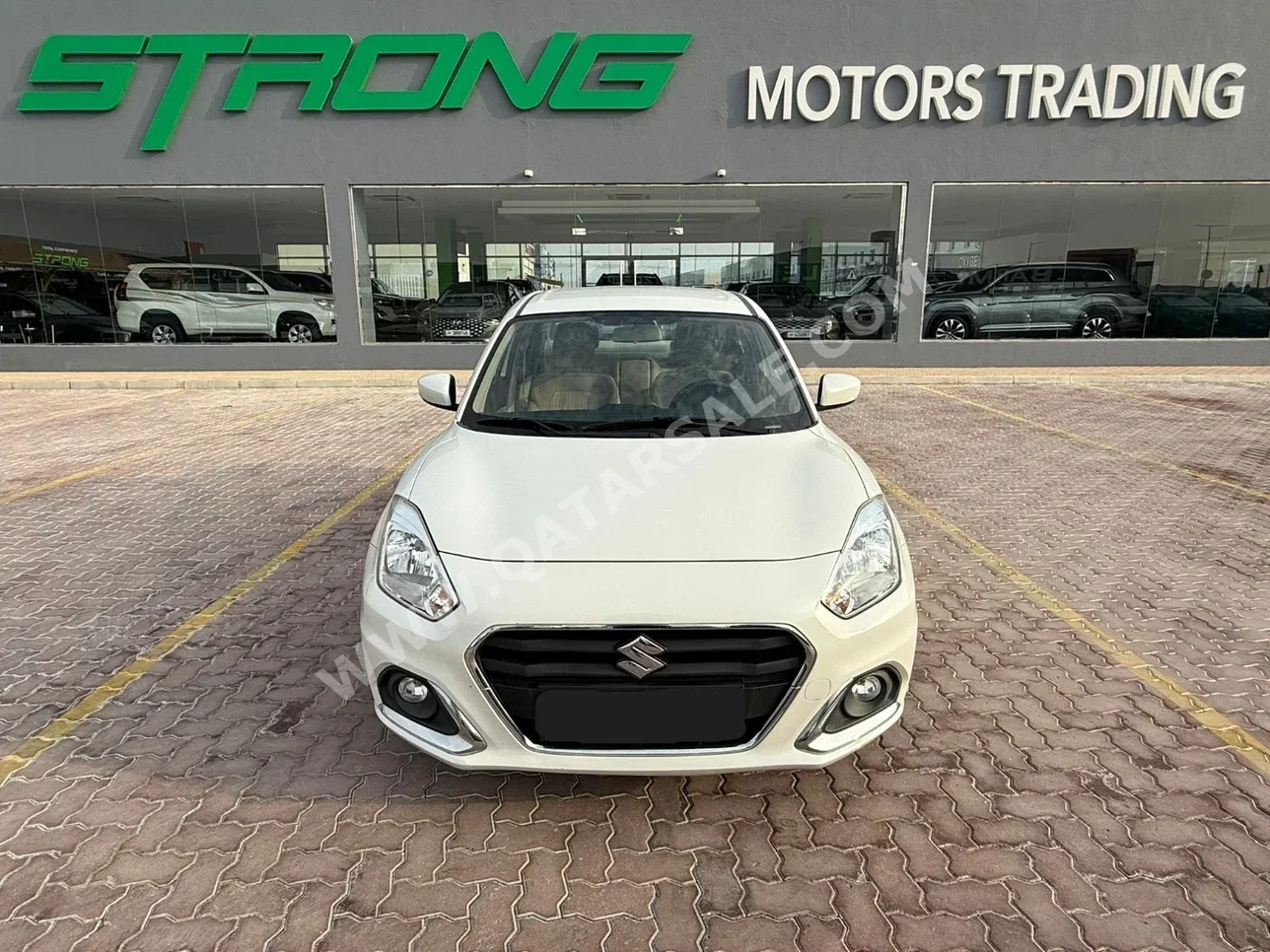 Suzuki  Dzire  2024  Automatic  100,000 Km  4 Cylinder  Front Wheel Drive (FWD)  Sedan  White