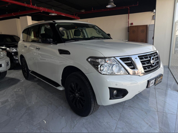 Nissan  Patrol  XE  2019  Automatic  161,000 Km  6 Cylinder  Four Wheel Drive (4WD)  SUV  White