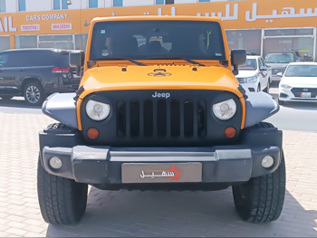 Jeep  Wrangler  Unlimited  2012  Automatic  171,831 Km  4 Cylinder  Four Wheel Drive (4WD)  SUV  Orange