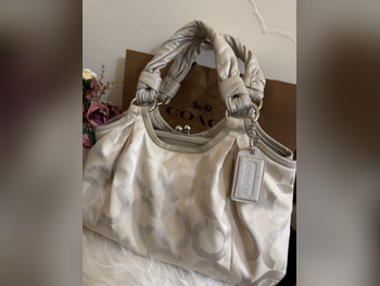 حقائب  - كريم  - نسائي