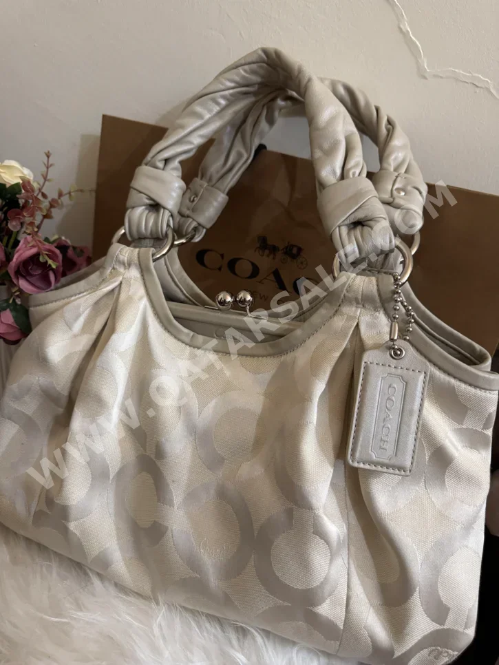 حقائب - كريم - نسائي