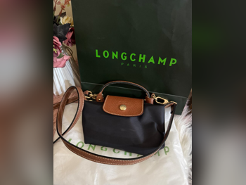 حقائب  - لونجشامب  - أسود  - نايلون  - نسائي