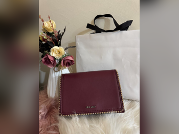 حقائب  - أحمر  - نسائي