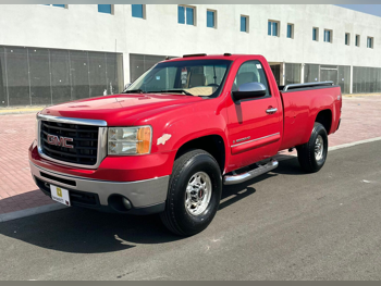 GMC  Sierra  SLE  2009  Automatic  415,610 Km  8 Cylinder  Four Wheel Drive (4WD)  Pick Up  Red