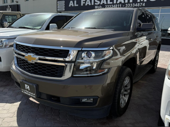 Chevrolet  Tahoe  LS  2015  Automatic  168,000 Km  8 Cylinder  Rear Wheel Drive (RWD)  SUV  Brown