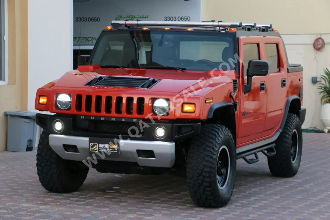 Hummer  H2  2009  Automatic  230,000 Km  8 Cylinder  Four Wheel Drive (4WD)  SUV  Orange