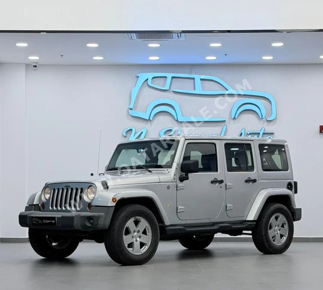 Jeep  Wrangler  2012  Automatic  297,000 Km  6 Cylinder  Four Wheel Drive (4WD)  SUV  Silver