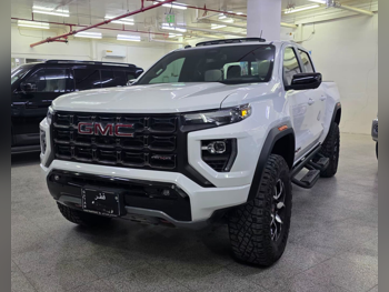 جي ام سي  كانيون  اي تي 4 اكس  2024  اوتوماتيك  7,000 كم  4 سلندر  دفع رباعي  بيكب  أبيض  تحت الضمان