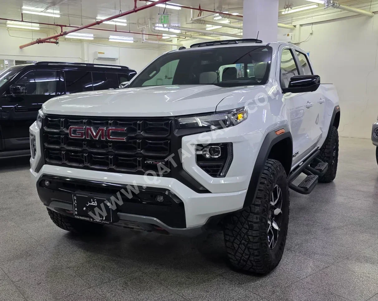 جي ام سي  كانيون  اي تي 4 اكس  2024  اوتوماتيك  7,000 كم  4 سلندر  دفع رباعي  بيكب  أبيض  تحت الضمان