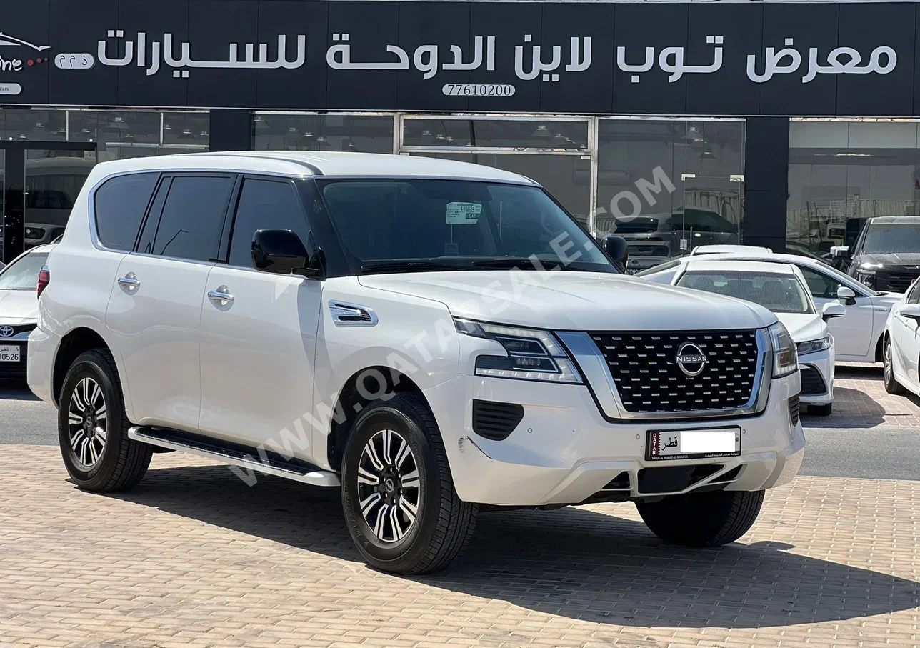 نيسان باترول اس اي 2024 اوتوماتيك 18,000 كم 8 سلندر دفع رباعي اس يو في أبيض تحت الضمان