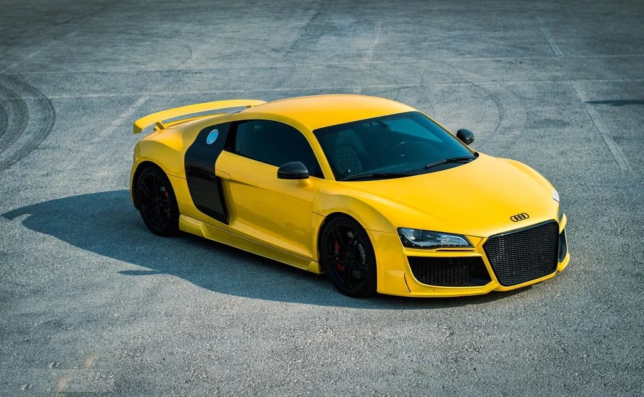 اودي  آر 8  2008  اوتوماتيك  141,000 كم  8 سلندر  دفع كلي مستمر  كوبيه \ سبورت  أصفر