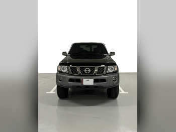 Nissan  Patrol  Super Safari  2022  Automatic  45,000 Km  6 Cylinder  Four Wheel Drive (4WD)  SUV  Black  With Warranty
