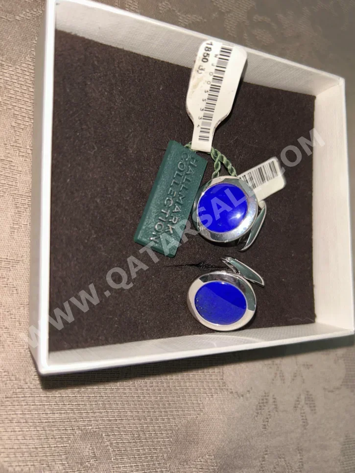 أزرار أكمام ازرق وفضي