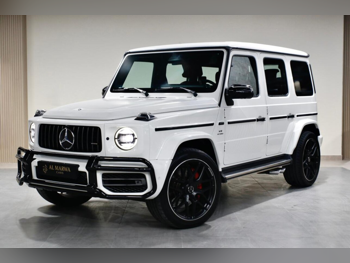 مرسيدس - بنز  جي - كلاس  63 اي ام جي  2020  اوتوماتيك  99,000 كم  8 سلندر  دفع رباعي  اس يو في  أبيض