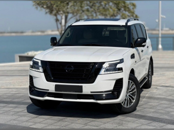 Nissan  Patrol  Platinum  2021  Automatic  69,000 Km  8 Cylinder  Four Wheel Drive (4WD)  SUV  White