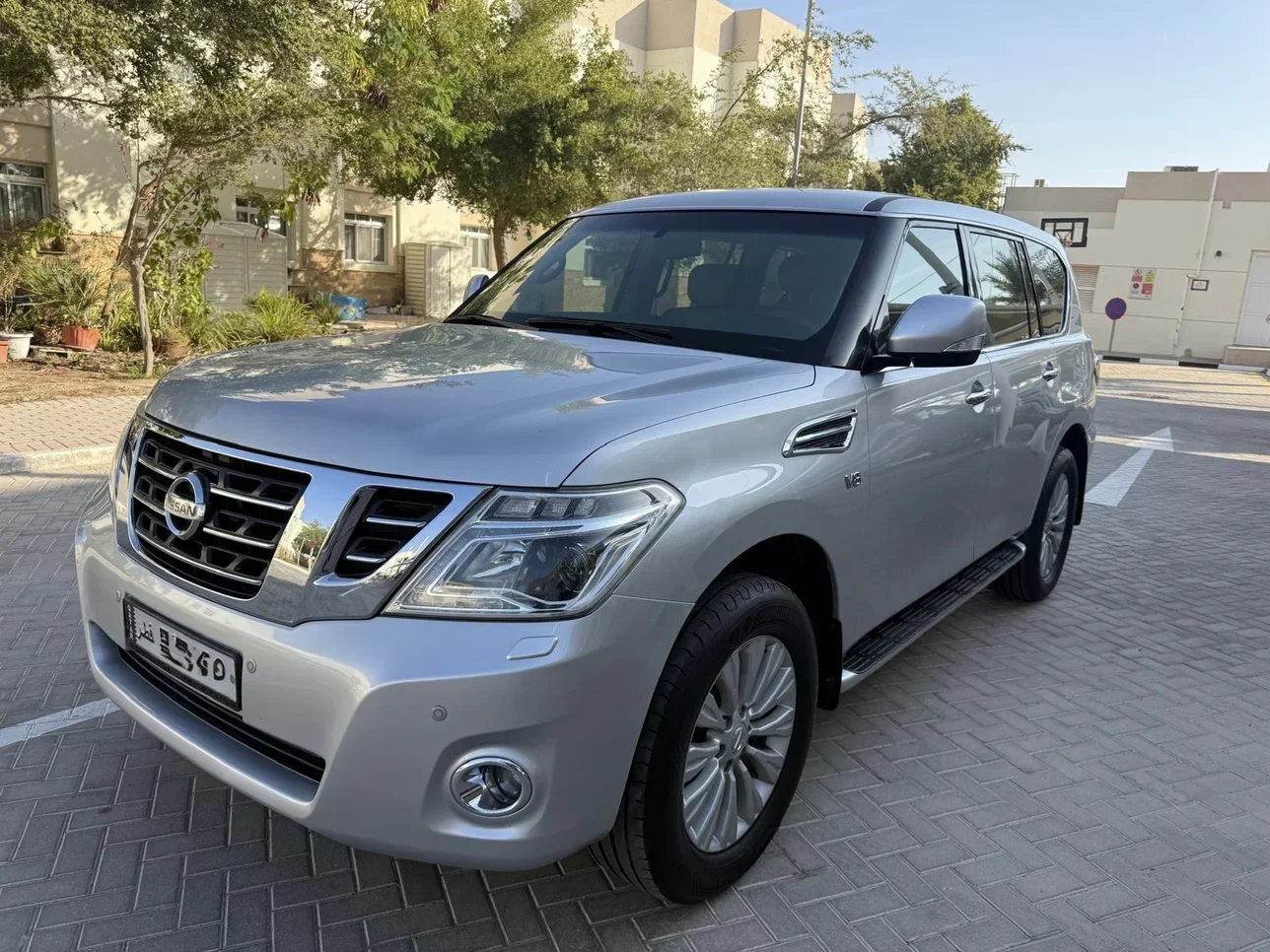 نيسان باترول تيتانيوم 2017 اوتوماتيك 103,000 كم 8 سلندر دفع رباعي اس يو في فضي