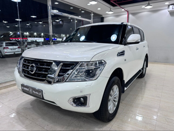 Nissan  Patrol  SE  2015  Automatic  240,000 Km  8 Cylinder  Four Wheel Drive (4WD)  SUV  White