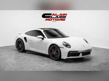 Porsche  911  Turbo  2022  Automatic  11,562 Km  6 Cylinder  Rear Wheel Drive (RWD)  Coupe / Sport  White