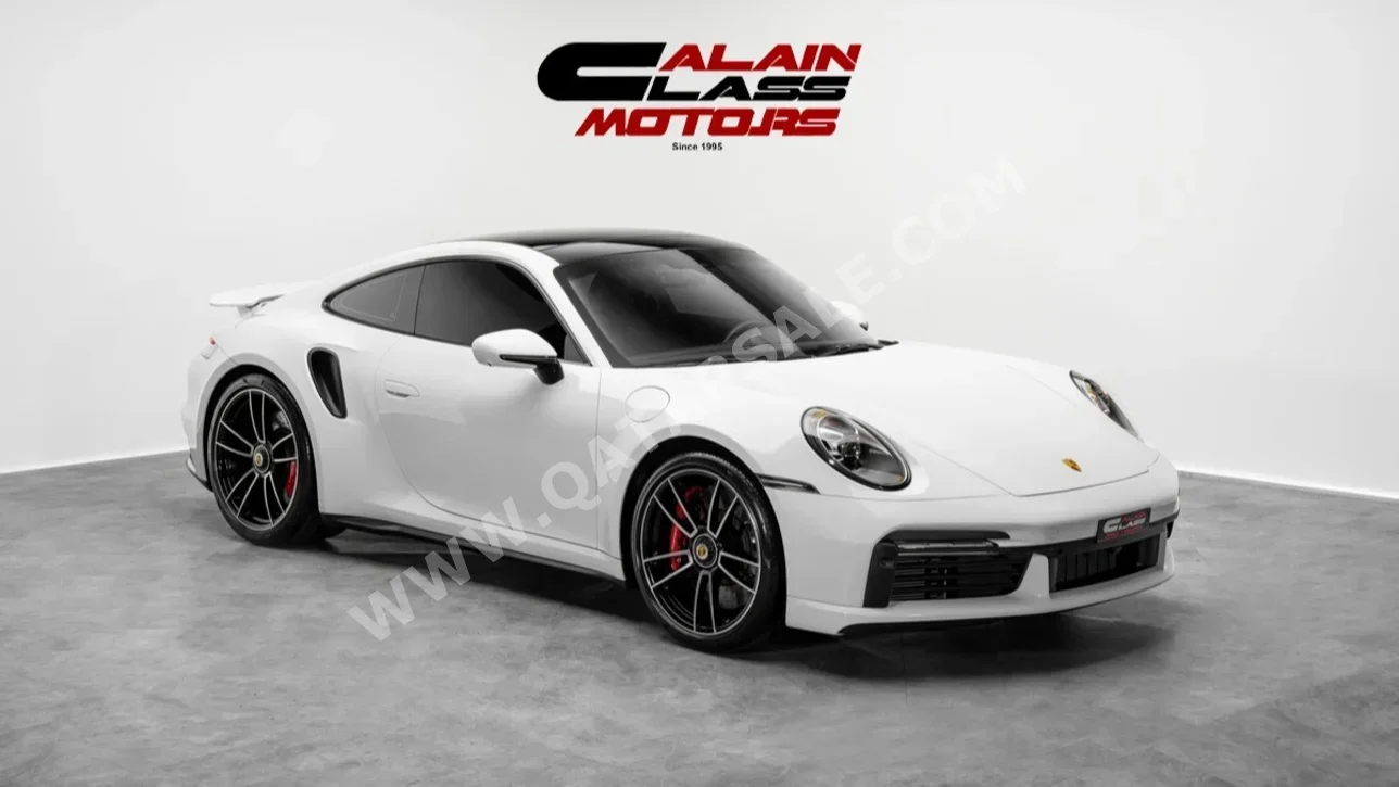 Porsche  911  Turbo  2022  Automatic  11,562 Km  6 Cylinder  Rear Wheel Drive (RWD)  Coupe / Sport  White