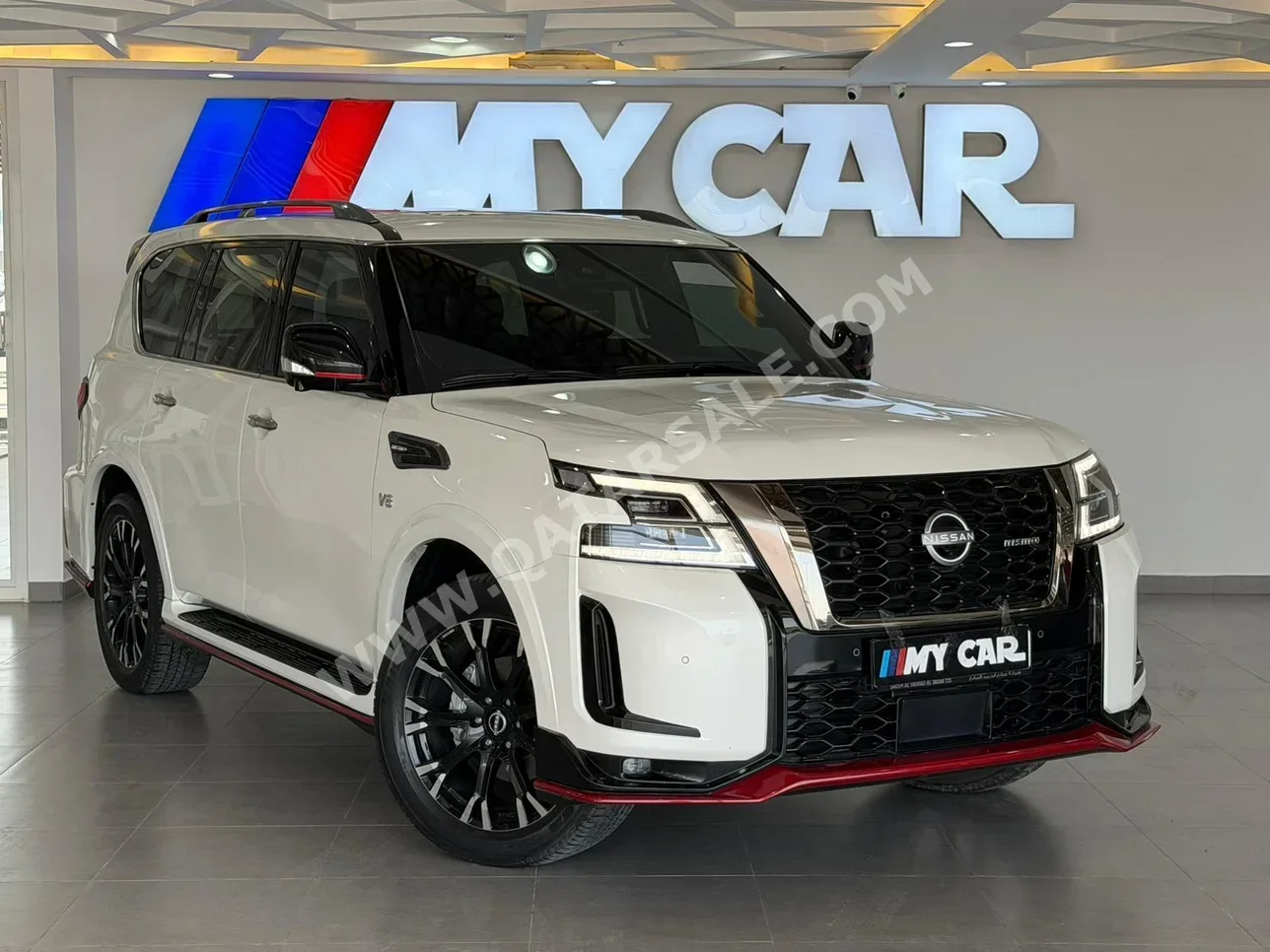 نيسان باترول نسمو 2023 اوتوماتيك 42,000 كم 8 سلندر دفع رباعي اس يو في أبيض تحت الضمان