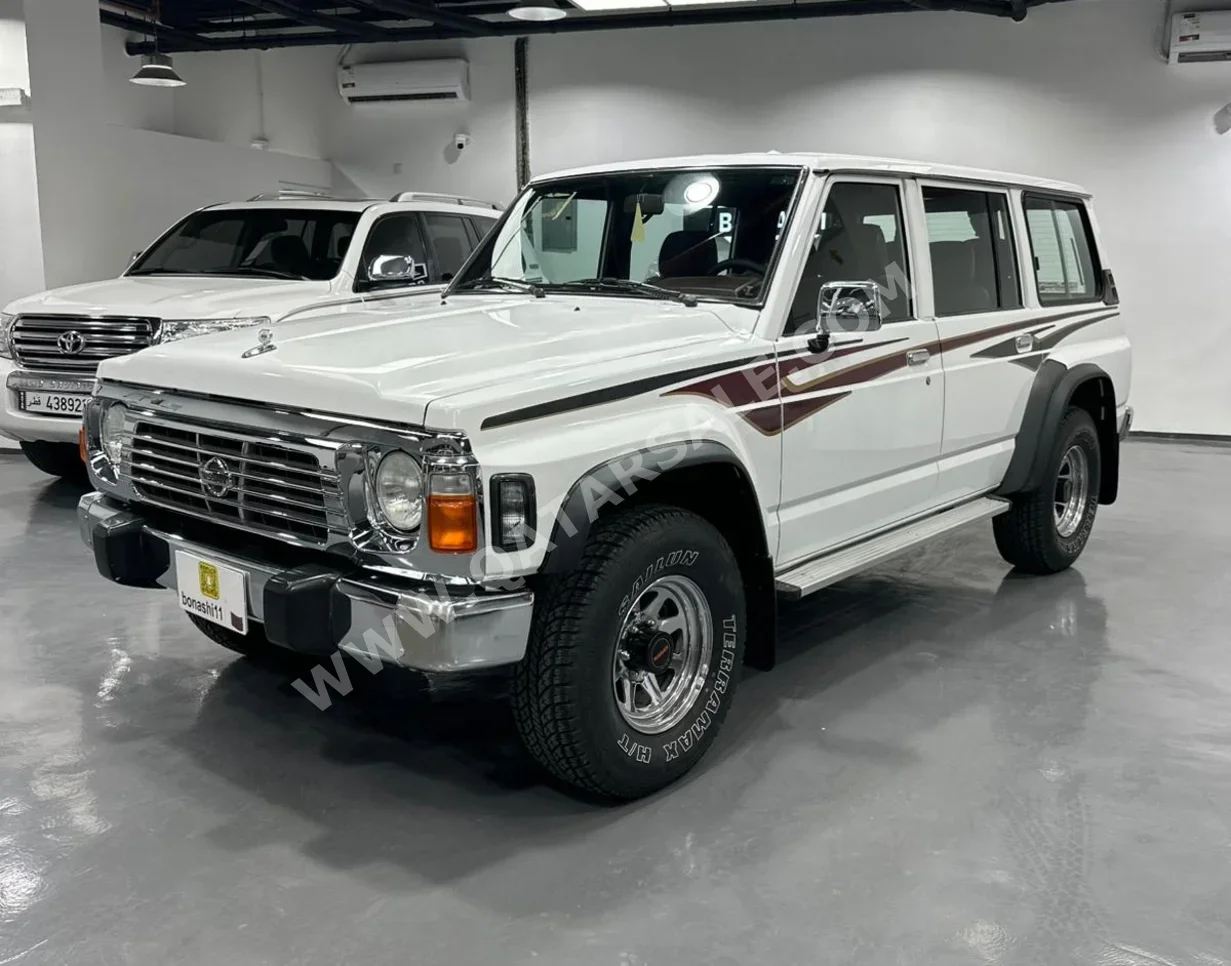 نيسان  باترول  جي ال  1997  عادي  72,554 كم  6 سلندر  دفع رباعي  اس يو في  أبيض