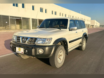 Nissan  Patrol  GL-V  2004  Automatic  282,960 Km  6 Cylinder  Four Wheel Drive (4WD)  SUV  White