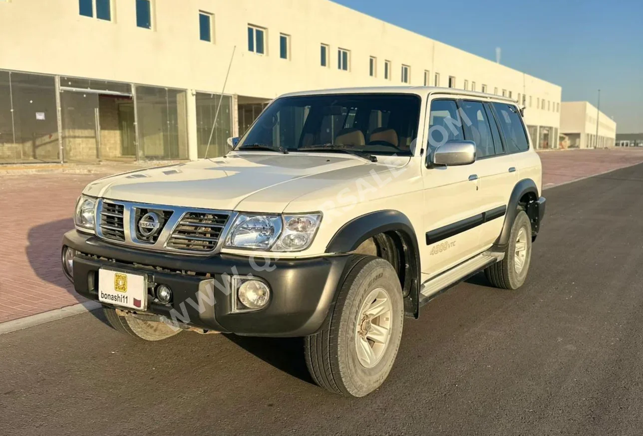 نيسان  باترول  جي ال - في  2004  اوتوماتيك  282,960 كم  6 سلندر  دفع رباعي  اس يو في  أبيض