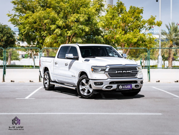 Dodge  Ram  1500 Laramie  2021  Automatic  215,000 Km  8 Cylinder  Four Wheel Drive (4WD)  Pick Up  White