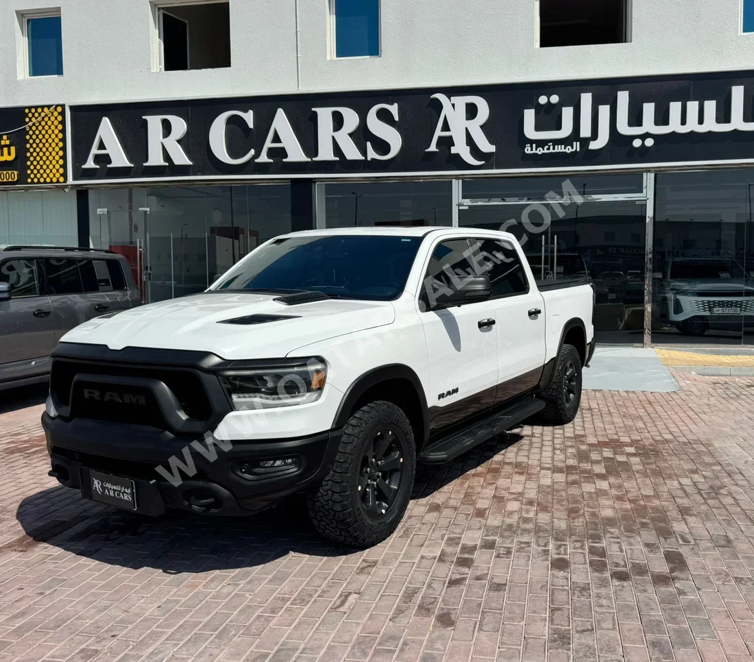 دودج  رام  ريبل  2023  اوتوماتيك  75,000 كم  8 سلندر  دفع رباعي  بيكب  أبيض  تحت الضمان